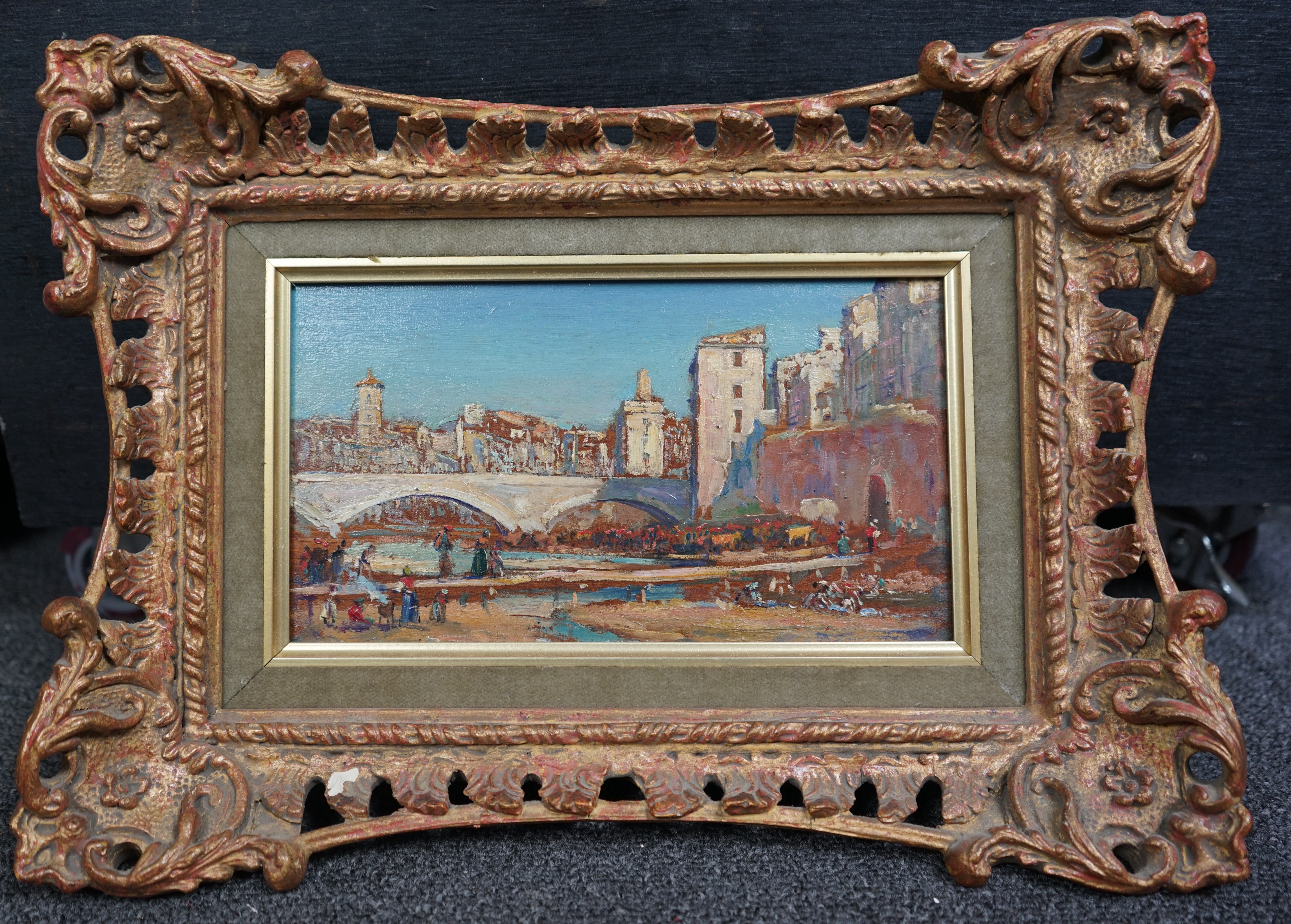 Arthur Trevor Haddon (British, 1864-1941), 'Procession along a river-bed, Gerona', oil on board, 11.5 x 21cm